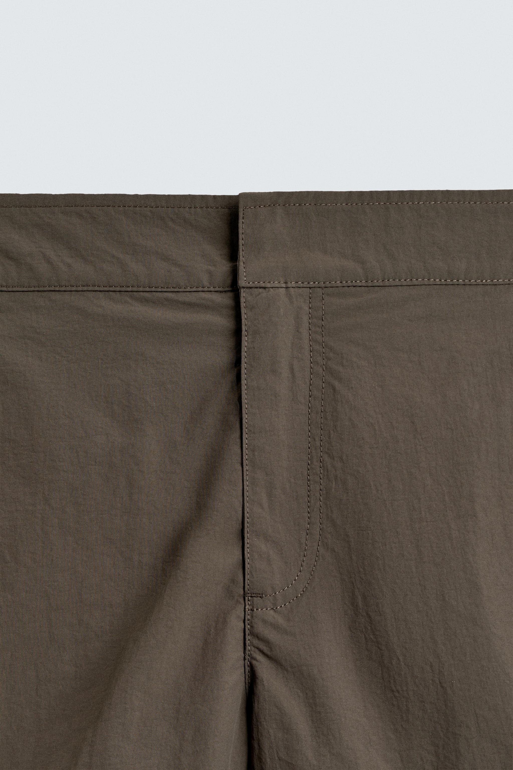 MID LENGTH BELT LOOP SWIMSUIT